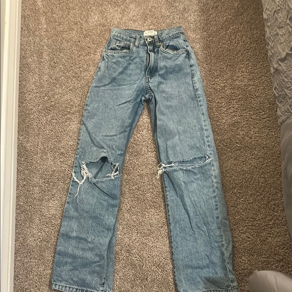 Distressed Blue Jeans